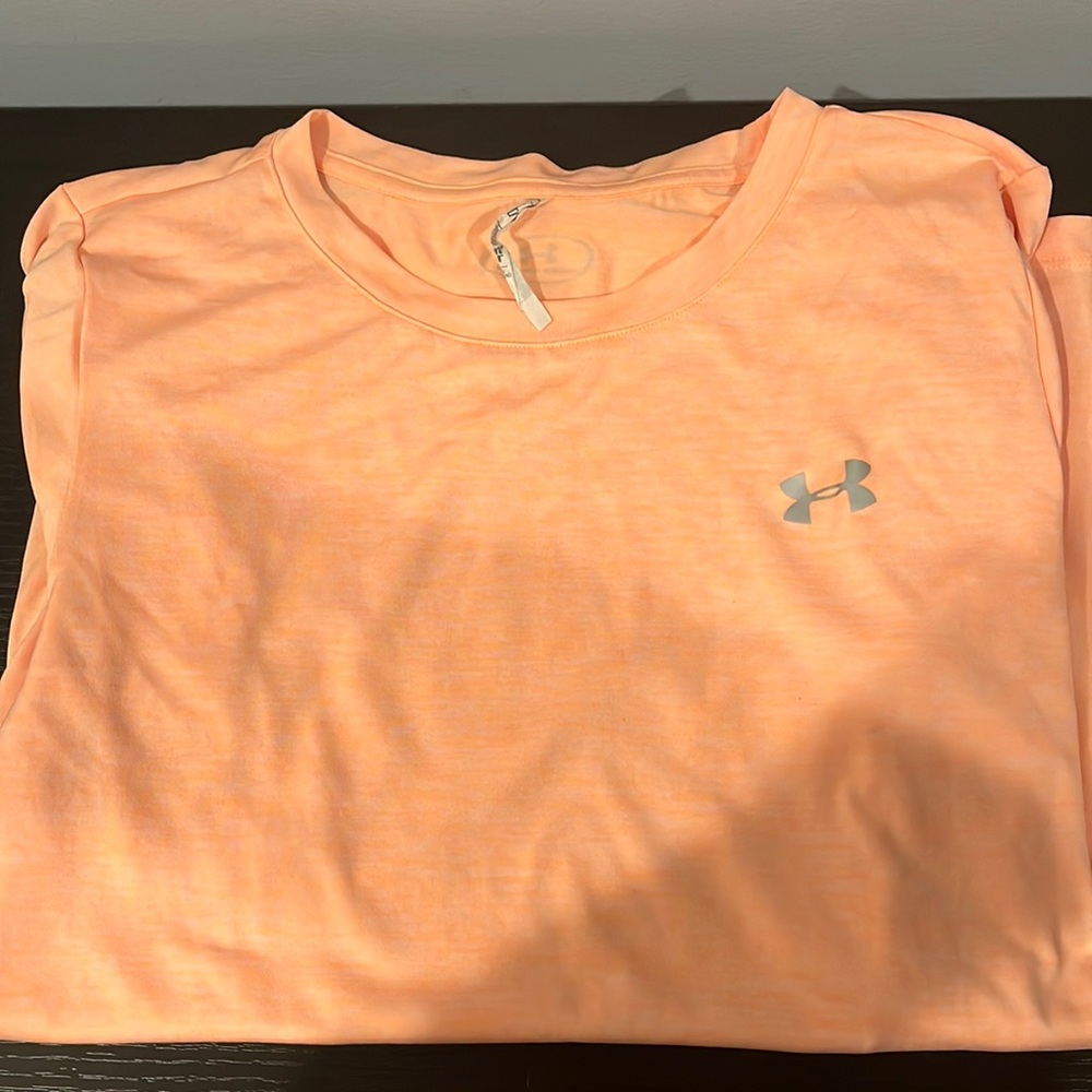 Orange womens under armour size medium.
